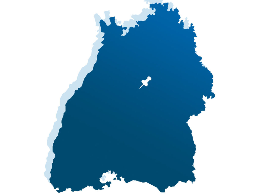 Innerhalb einer blauer Silhouette von Baden-Württemberg markiert ein weißer Pinn Stuttgart